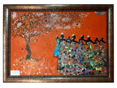 Upcycled aluminium frame, repurposed to display a landscape of women dancing under a blossom tree.  This beautiful piece has a rustic background which compliments the frame and reflective mosaic-like texture for the colourful women's dresses.