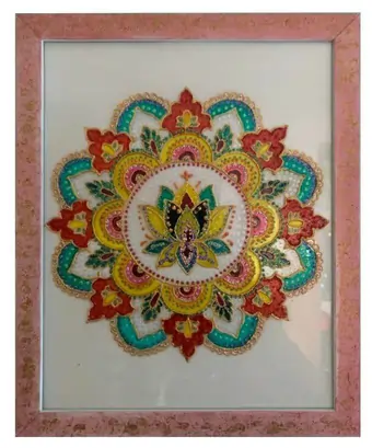 Upcycled wooden frame, repurposed to display a portrait of an elaborate mandala with an intricate lotus flower in the centre of it.  This detailed geometric design is hand-painted on glass with crimson, green and golden hues.